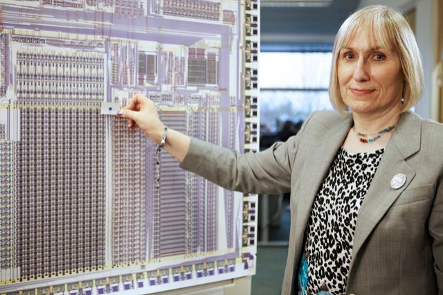 Sophie Wilson holding a processor